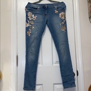 Jeans with flower embellishments